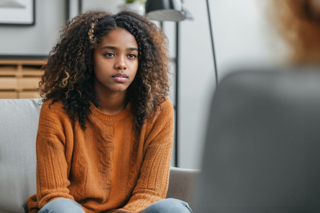 a-teen-girl-speaking-in-therapy-session